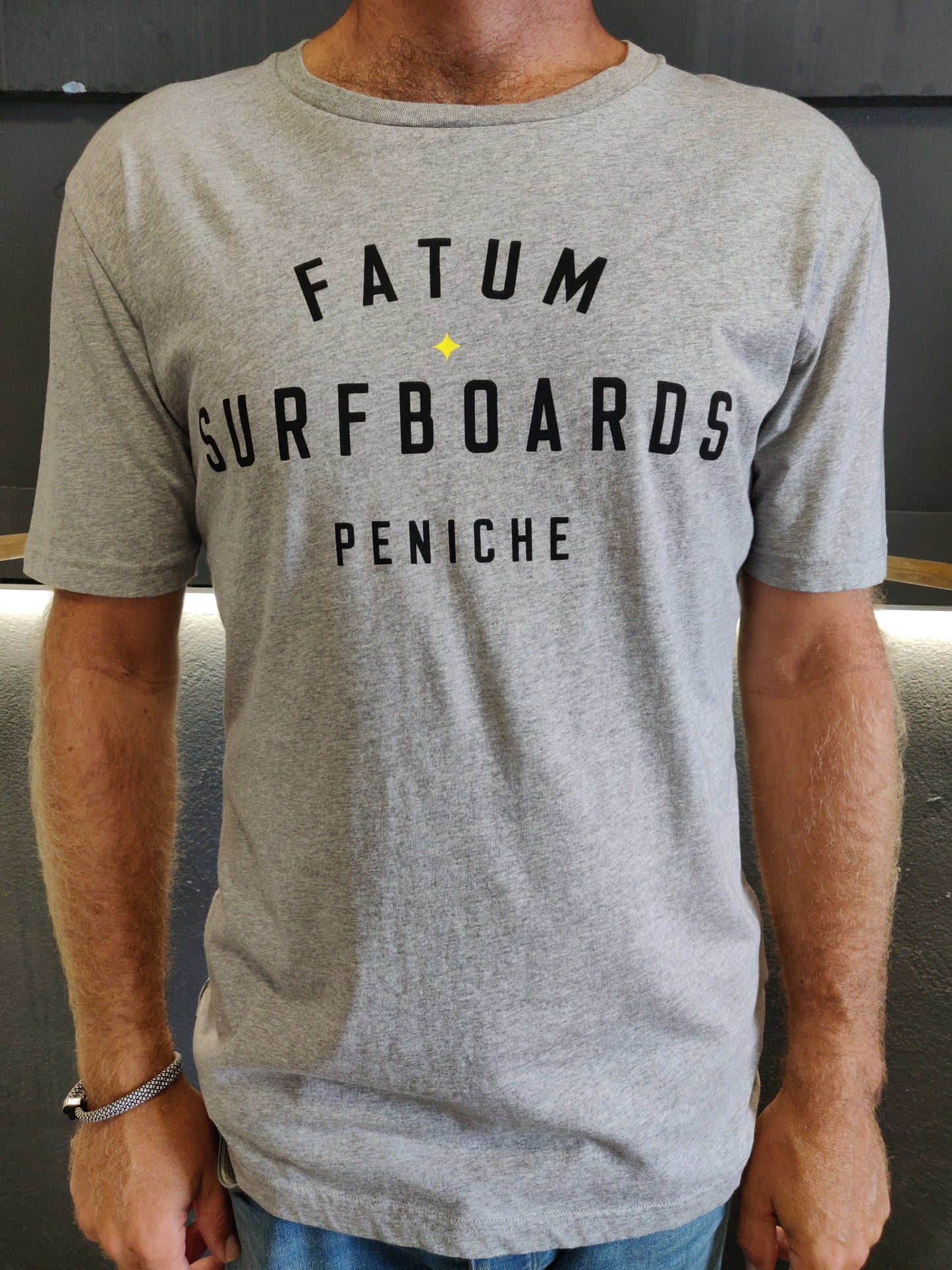 Fatum Stamp Tee in Grey.  Model is wearing an L and is 186cm tall at 85kg. (6'1" and 14 st)