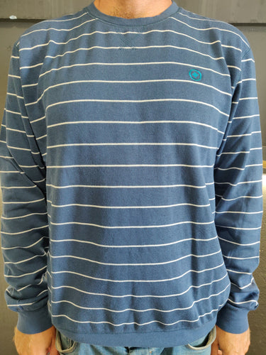 Fatum Ottis Sweatshirt in Blue with white stripes. Model is wearing an L and is 186cm tall at 85kg. (6'1