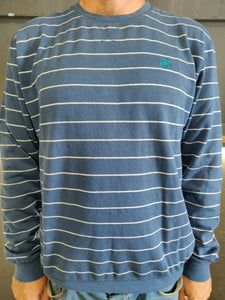 Fatum Ottis Sweatshirt in Blue with white stripes. Model is wearing an L and is 186cm tall at 85kg. (6'1" and 14 st)