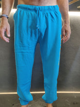 Load image into Gallery viewer, Fatum Chill Pants in Sea Blue. Model is wearing an XL and is 186cm and 86kg.