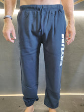 Load image into Gallery viewer, Fatum Chill Pants in Navy. Model is wearing an XL and is 186cm and 86kg.