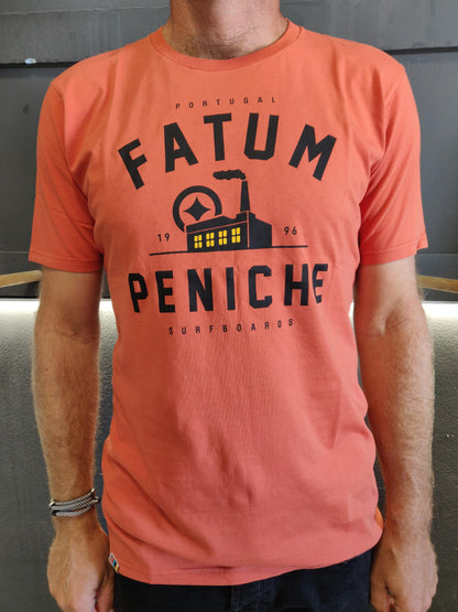 Fatum Factory Tee in Orange. Model is wearing an L and is 186cm and 86kg.